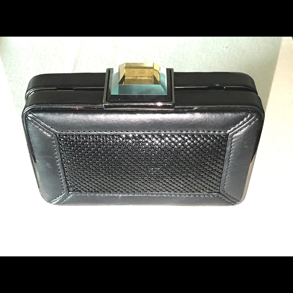 Franchi Handbag w/hidden gunmetal shoulder strap